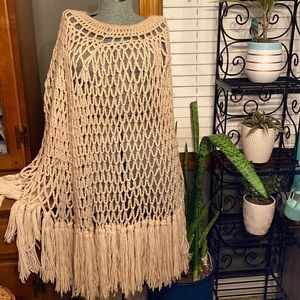 Beautiful ivory hand knitted poncho with tassels